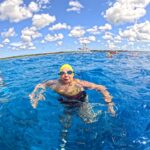 Swimming Group At Sea